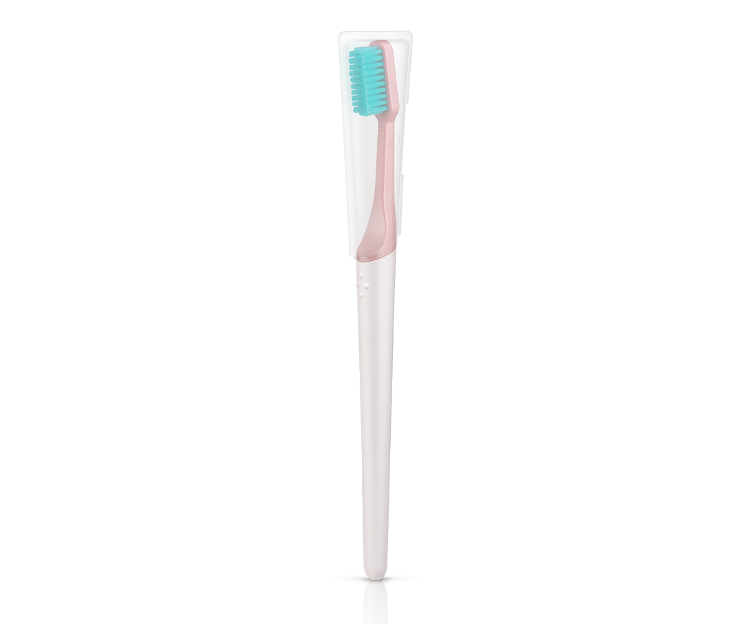 TIO Zubní kartáček Medium 1 ks korálově růžový TIO