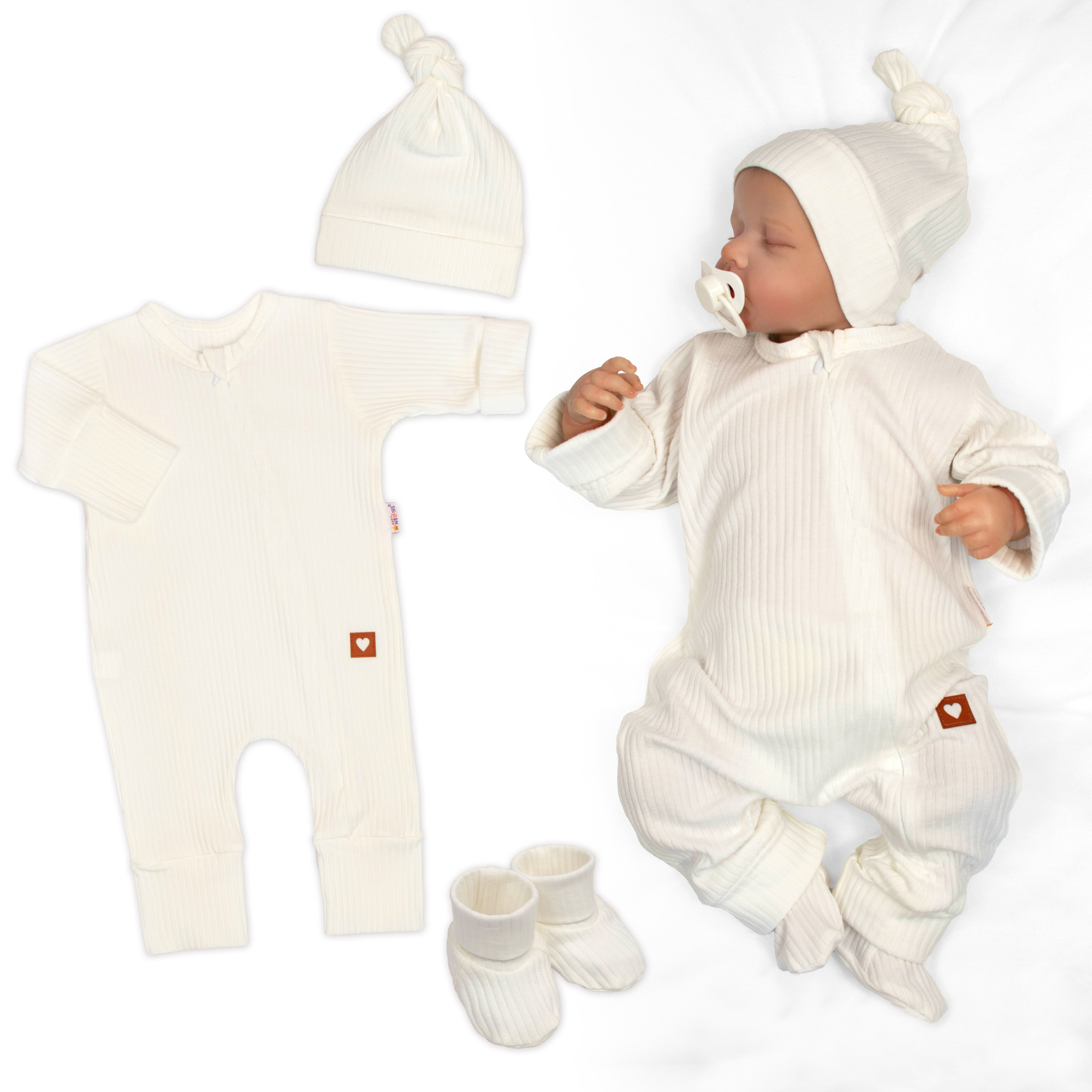 Baby Nellys Rostoucí žebrovaný overálek